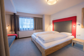 Schlafzimmer des Apartments "Godn Leni"