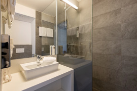 Badezimmer im Hwest Hotel Hall