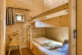 Kinderzimmer mit Stockbett im Chalet vom Naturresort Puradies.